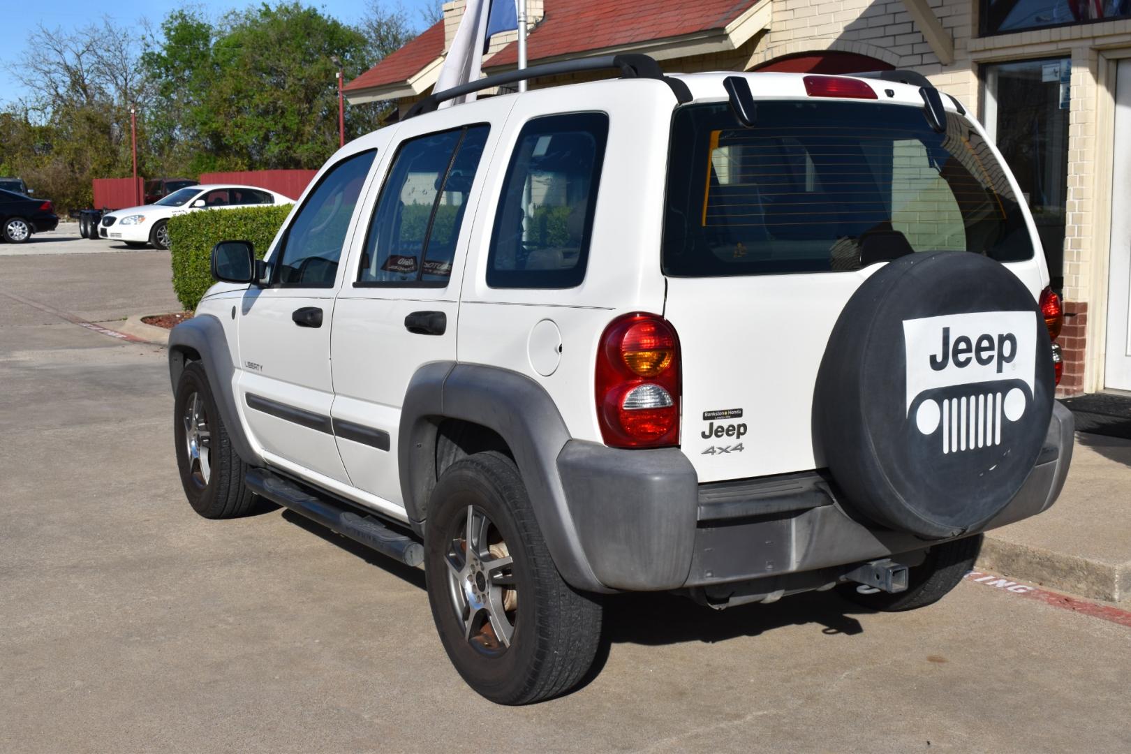 2004 White /Tan Jeep Liberty (1J4GL48K34W) , located at 5925 E. BELKNAP ST., HALTOM CITY, TX, 76117, (817) 834-4222, 32.803799, -97.259003 - Buying a 2004 Jeep Liberty can offer several benefits, depending on your needs and preferences: Off-road Capability: The Jeep Liberty is known for its off-road prowess, with features such as available four-wheel drive and a rugged design that can handle various terrains. If you enjoy outdoor activi - Photo#2